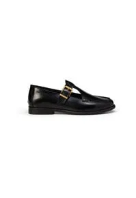 Marc O’Polo Slipper Schwarz in Größe 38 - Elegante Slipper mit gepolsterter Lederdecksohle und verstellbarem Riemchen für optimalen Tragekomfort. Ideal für jeden Anlass und modisch kombinierbar.