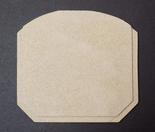 Zugumlenkung für Thermia München Kaminofen - Ersatzteil für Modelle wie München und Hamburg, aus hochwertigem Vermiculite für optimale Wärmeleitung und Langlebigkeit.