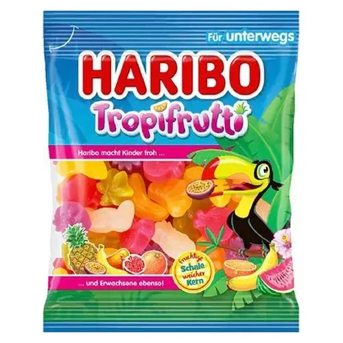 Haribo Tropifrutti 30x100g im Karton - Fruchtgummis/Lakritze, fruchtiger Genuss in praktischen 100g Beuteln, perfekt für Partys oder zum Snacken.
