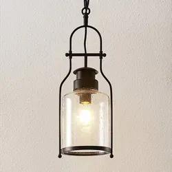 Lindby Rozalie Pendelleuchte Clear/Black - Nostalgischer Vintage-Look - Stehleuchte im nostalgischen Laternen-Design mit dekorativen Luftblasen im Glas, die funkelnde Lichtreflexe erzeugen und für gemütliche Atmosphäre sorgen.