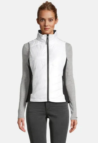 Krimson Klover Steppweste Sela Vest – Wendbare Midlayer - Die Sela Vest kombiniert Stil und Funktionalität. Ideal als isolierte Midlayer-Weste für kalte Tage, bietet sie durch das wasserabweisende Material und die wendbare Gestaltung vielseitige Tragemöglichkeiten.