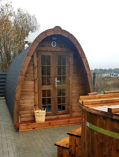 Holzsauna Gartensauna - Trockensauna für entspannende Wellnessmomente - Gemütliche Holzsauna für den Außenbereich, Platz für bis zu 8 Personen, energieeffizient mit elektrischer Heizung. Ideal für entspannende Stunden im eigenen Garten.