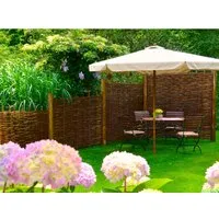Tetzner & Jentzsch Gartenzaun ASO Weidengeflechtzaun - Zaunelemente: Hochwertiger ASO Weidengeflechtzaun aus geflochtenen Haselnussruten, ideal für natürliche Abgrenzungen im Garten.