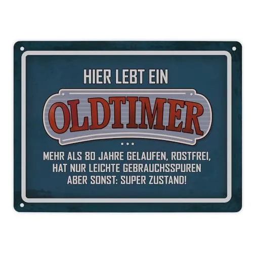 Metallschild XL mit Retro- Stil Motiv und Spruch: Hier wohnt ein Oldtimer