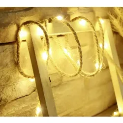 LED-Deko-Tau Licht Beleuchtung mit 20 warmweißen LEDs - 2 Meter lange Lichterkette mit 20 warmweißen LEDs, ideal für stimmungsvolle Dekoration in Wohnräumen. Flexibel einsetzbar und energieeffizient.