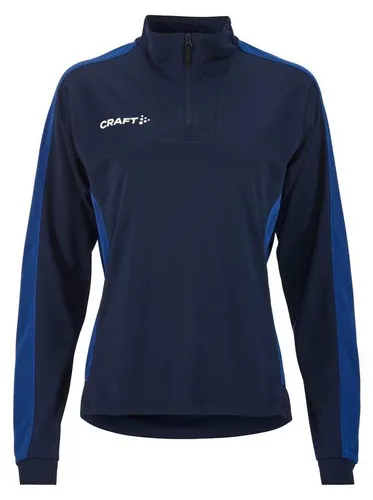 Craft Evolve 2.0 Contrast Half Zip W - Elastisches Midlayer mit hervorragendem Feuchtigkeitstransport. Ideal für intensives Training, aus 100% recyceltem Polyester und mit auffälligen Kontrastelementen. Perfekt für Teams, die ihren Look modernisieren möchten.