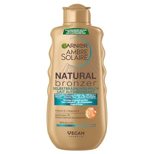 GARNIER Ambre Solaire Natural Bronzer Selbstbräunungsmilch - Holen Sie sich eine natürliche Bräune ohne Flecken! Die schnell einziehende Milch spendet Feuchtigkeit und hält bis zu 1 Woche. Ideal für alle Hauttypen. Inhalt: 175 ml.