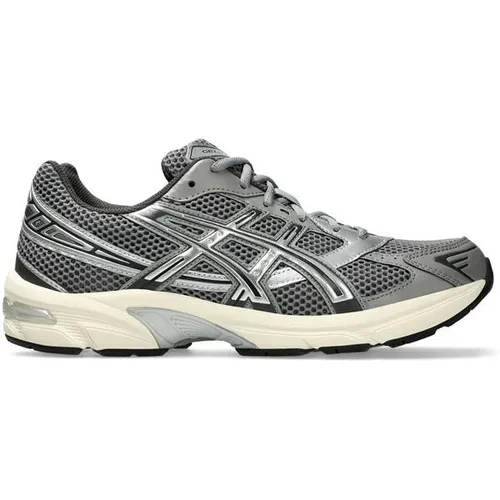 Asics Gel-1130 Laufschuh in Grau (Gr. 44 1⁄2) - Hochwertiger Laufschuh mit atmungsaktivem Obermaterial aus Textil und Synthetik. Ideal für sportliche Aktivitäten, komfortable Passform dank herausnehmbarer Innensohle.