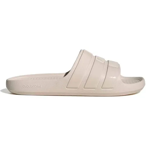 adidas Unisex Adilette Flow Slides - Dusch- & Badeschuhe für Herren mit regulärer Passform und einteiliger, vorgeformter Konstruktion für optimalen Komfort und Stil.