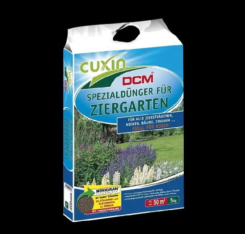 CUXIN DCM Spezialdünger für Ziergarten mit MINIGRAN® TECHNOLOGY - 5 kg - [FÜR DEN ZIERGARTEN] Ideal für Ziersträucher und Stauden, bietet dieser organisch-mineralische Dünger eine langanhaltende Nährstoffversorgung von bis zu 100 Tagen. [ANWENDERFREUNDLICH] Dank der praktischen Streuschachtel ist die Anwendung einfach und präzise.