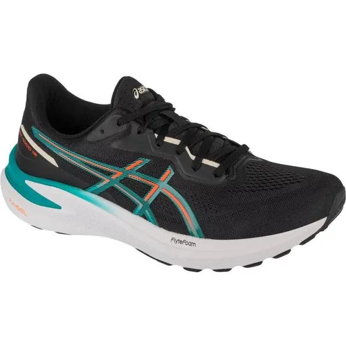ASICS GT-1000 13 Herren Stabilitätsschuh - Schwarz, Blau, Größe 43.5 - Laufschuhe mit optimaler Dämpfung und Stabilität, ausgestattet mit 3D Guidance System und PureGEL Technologie für ein angenehmes Laufgefühl und maximalen Komfort.