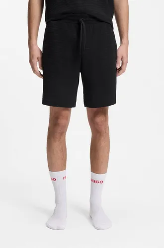 HUGO Austin Shorts - Herren-Shorts aus 60% Baumwolle und 40% Polyester, bequem und ideal für warme Tage.