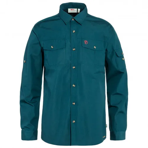 Fjällräven Singi Trekking Shirt LS M mountain blue (570) M - Hochwertiges Trekking-Shirt für Herren aus robustem G-1000 Original, vorgewaschen für besten Tragekomfort. Mit Belüftungsöffnungen und praktischen Taschen ideal für Outdoor-Abenteuer.