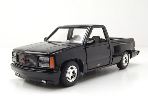 GMC Sierra GT Pick Up 1992 schwarz Modellauto 1:24 - Detailgetreues 1:24 Modellauto des GMC Sierra GT Pick Up 1992. Mit OVP und hochwertigem Die-Cast Material. Ideal für Sammler und als Hingucker in jeder Vitrine.