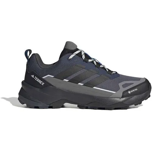 adidas Terrex Skychaser AX5 GORE-TEX Multisportschuhe 46 2/3 grau/blau - Wasserdichte Multisportschuhe mit GORE-TEX-Technologie in Grau/Blau (Größe 46 2/3). Ideal für Outdoor-Aktivitäten und Wandern. Entdecken Sie weitere adidas Terrex Modelle bei Bergfreunde.de!