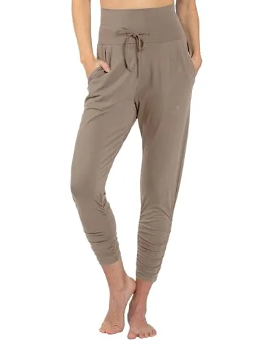 Magadi Yogahose Francis Dust aus Naturmaterial M - Vielseitige Yogahose mit verstellbarem Bund für optimalen Halt und individuelle Passform. Aus nachhaltigen Materialien gefertigt, bietet sie Komfort und Bewegungsfreiheit für jede Yoga-Session.