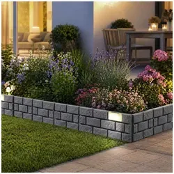 Beeteinfassung Nessa Solar Steinmauer 4-teilig Grau - Die stilvolle Beetumrandung Nessa in Steinmaueroptik sorgt für einen eleganten Rahmen Ihrer Beete. Mit integriertem Solarpanel für stimmungsvolles Licht am Abend. Set aus 4 Modulen, Maße: 43,5 cm pro Modul.