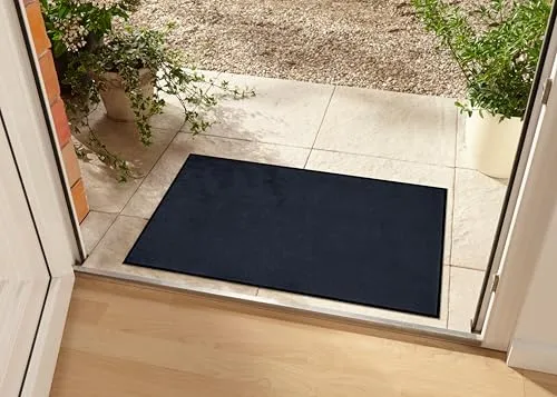 Hanse Home Waschbare In- & Outdoor Fußmatte Uni Schwarz 80x120 cm - Hochwertige Schmutzfangmatte für Innen- & Außenbereiche, pflegeleicht und waschbar, sorgt für Sauberkeit und bietet stabilen Halt durch rutschfesten Gummirücken.