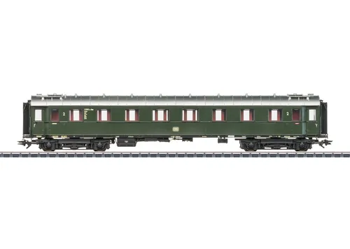 Märklin 42500 H0 Schnellzugwagen B4üwe, 2. Klasse der DB - Modelleisenbahn: Detaillierter Schnellzugwagen B4üwe der DB, ideal für realistische Nachbildungen mit mehrfarbiger Inneneinrichtung und vorbereiteten Einbauoptionen für Beleuchtung.