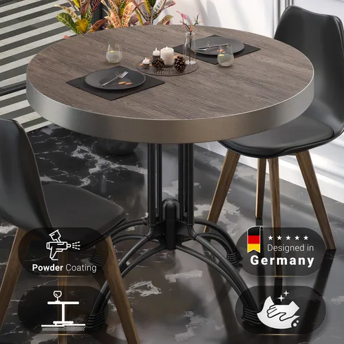 BMLG Bistro Tisch Ø 70 cm – Edelstahl Rand, Light Wenge/Schwarz - Der elegante BMLG Bistro Tisch mit Ø 70 cm kombiniert eine robuste HPL Tischplatte mit einem langlebigen Aluminiumgestell. Ideal für Garten und Gastronomie, bietet er Witterungsbeständigkeit und Hitzeunempfindlichkeit.