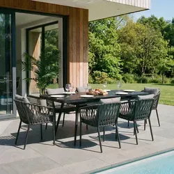IDIMEX Garten-Essgruppe SUNNY - Ausziehbares Gartenmöbel Set - Gartenmöbel-Sets mit 6 Stühlen und einem praktischen ausziehbaren Tisch für flexible Nutzung im Freien, pulverbeschichtet in elegantem schwarz-grau.