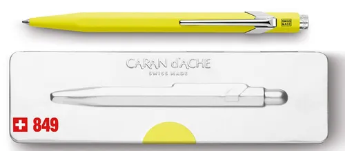 CARAN d ACHE Kugelschreiber 849 POPLINE - Fluo Gelb, sechseckiger Aluminium-Schaft mit flexiblem Clip und Goliath Patrone
