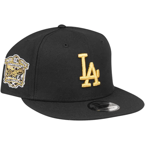 New Era 9Fifty Snapback Cap ANNIVERSARY Los Angeles Dodgers - Herren Snapback Cap in Schwarz, ideal für sportliche Freizeitlooks. Aus 100% Polyester gefertigt, bietet sie einen lässigen Stil für den Sommer.