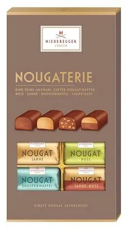 Niederegger Schokolade – Feine Nougat Happen 200g - Entdecken Sie die Niederegger Nougaterie mit 200g köstlichen Nougat Happen in vier edlen Sorten. Perfekt zum Teilen oder Verschenken – ein Genuss für echte Liebhaber feiner Confiserie!