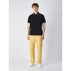 Champion Poloshirt schwarz M (48/50) - Herren-Shirt aus 100% Baumwolle, sportlicher Stil in klassischem Schwarz, ideal für Freizeit und Sport.