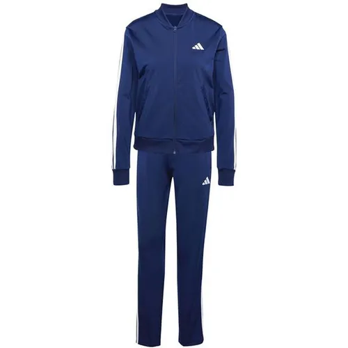 adidas Damen ESSENTIALS 3-STRIPES TRACKSUIT Dark Blue, M - Trainingsbekleidung mit regulärer Passform, aus 100% recyceltem Polyester; ideal für Komfort und Stil beim Sport mit Taschen und elastischem Bund.
