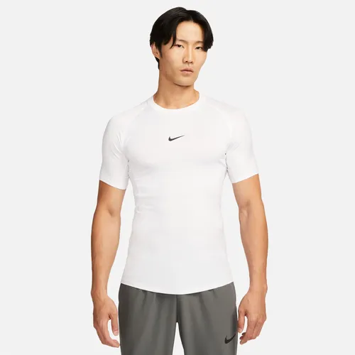 Nike FB7932-100 M NP DF Tight TOP SS Sweatshirt Herren - White/Black 2XL - Shirts & Tops mit tailliertem Schnitt und innovativer Dri-Fit-Technologie für optimalen Komfort und Schweißmanagement.