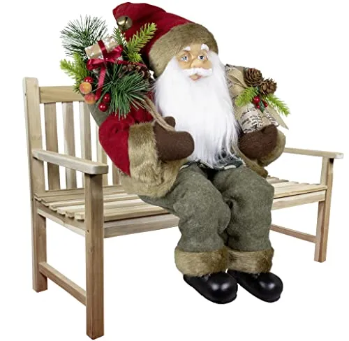 Christmas Paradise Sitzender Weihnachtsmann 45cm Deko-Figur - Weihnachtlicher Zierschmuck, handgefertigte Dekofigur mit freundlichem Gesicht und großem Geschenkesack – perfektes Highlight für festliche Stimmung im ganzen Haus.