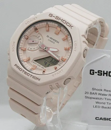 G-Shock Analog Uhr in Rosa-Creme - Chronograph mit Weltzeitfunktion und 20 Bar Wasserdichtigkeit, ideal für Sportler und Outdoor-Aktivitäten. Genießen Sie die perfekte Kombination aus Stil und Funktionalität.