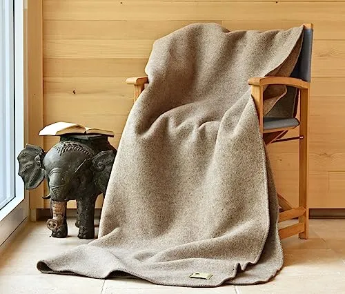 Warme Kuscheldecke Naturalana Doubleface - 100% Schurwolle von Merinoschafen - Kuschelige Wohndecke aus 100% Schurwolle mit hervorragender Wärmeisolierung. Ideal für Couch und Bett, atmungsaktiv und strapazierfähig. Perfekt für die ganze Familie und in verschiedenen Farben erhältlich.