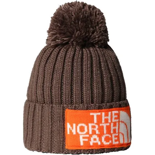 The North Face Heritage Ski Tuke - Smokey Brown/TNF Orange (88O) OS - Warme Wintermütze aus 100% recyceltem Material, ideal für Skifahrer und Alltag. Stilvoll mit auffälligem Bommel und überhöhten Rippen für zusätzlichen Komfort.