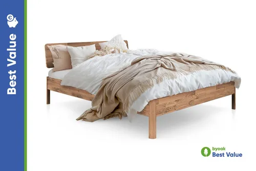byoak Massivholzbett PENNY mit Holzkopfteil - Massivholzbett aus Wildeiche oder Kernbuche, geölt für natürliche Schönheit und Langlebigkeit. Ideal für stilvolle Schlafzimmer, vereint Komfort und Eleganz.