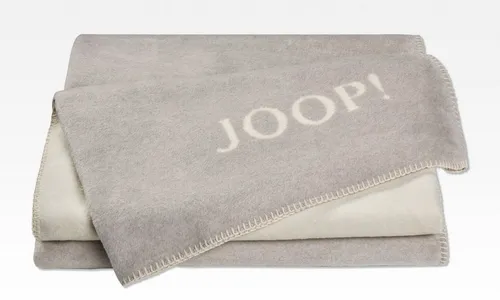 JOOP! Wohndecke Uni Doubleface grau - Hochwertige Wohndecke aus Baumwollmischgewebe in elegantem Grau. Ideal für gemütliche Abende. Maße: 150 cm breit, 1 cm hoch. Entdecken Sie die Qualität von JOOP! und sichern Sie sich 10€ Willkommens-Gutschein bei Newsletter-Anmeldung.