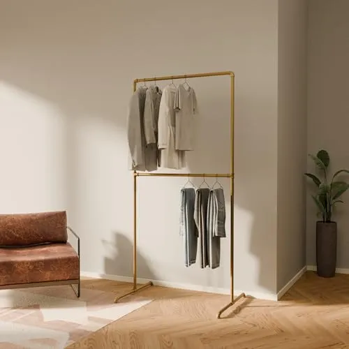 pamo. design Kleiderständer LAS gold - stilvolle, freistehende Garderobe - Der pamo Kleiderständer LAS in Gold vereint Stabilität und modernes Design. Mit 99 cm Breite und 194 cm Höhe ist er ideal für platzsparende Kleideraufbewahrung und lässt sich einfach montieren. Perfekt für jeden Raum!