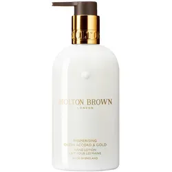 Molton Brown Mesmerising Oudh Accord & Gold Body Lotion 300 ml - Luxuriöse Körperpflege mit orientalischem Duft, spendet langanhaltende Feuchtigkeit und ist ideal für empfindliche Haut. Genießen Sie ein verwöhnendes Wellnesserlebnis!