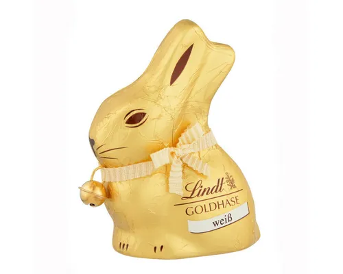 Lindt Goldhase mit weißer Schokolade - 50g Hohlfigur - Entdecken Sie den Lindt Goldhasen aus weißer Schokolade (50g). Diese zarte Hohlfigur vereint klassischen Osterzauber mit cremigem Geschmack. Ideal als Geschenk oder für die festliche Dekoration.