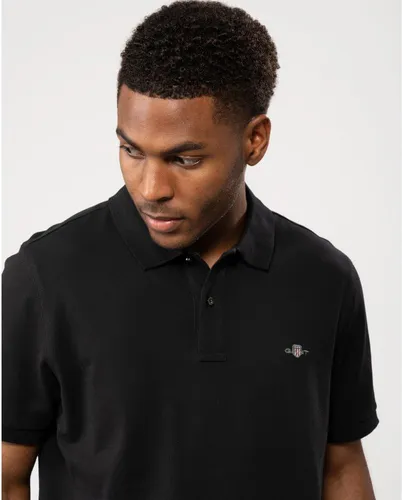 Gant Herren Reg Shield Pique Polohemd Schwarz XXL - Poloshirt für Herren mit normaler Passform, Flachstrickkragen und grafischer Gant Stickerei auf der Brust - ideal für einen sportlichen Look.