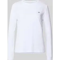 GANT REG SHIELD LS T-SHIRT Damen Langarmshirt - Klassisches Damen-Langarmshirt in Weiß von GANT, aus 100% Baumwolle, ideal für Büro und Freizeit, mit kleiner Logostickerei auf der Brust.