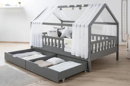 Ticaa Hausbett Kim mit Rausfallschutz und Schubkasten - Abenteuerbett für Kinder, höhenverstellbar und aus nachhaltigem Kiefernholz, inklusive Tüll-Set für individuelle Gestaltungsmöglichkeiten.
