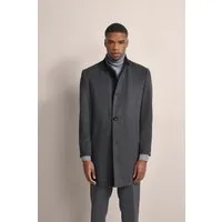 Bugatti Herren Mantel mit Stretchfunktion - Eleganter bugatti Mantel mit Stretchfunktion für optimale Bewegungsfreiheit. Der Slim Fit und moderne Stehkragen machen ihn zum perfekten Begleiter für stilbewusste Männer. Genießen Sie den Komfort der hochwertigen Woll-Baumwoll-Mischung.