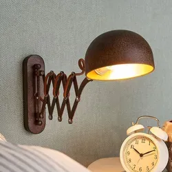 Lindby Wandleuchte Curtis - Vintage Wandlampe aus Metall, 1-flammig E14 - Lampen für jeden Raum: Diese hochwertige Wandlampe im rustikalen Landhausstil sorgt für eine gemütliche Atmosphäre und ist mit einem praktischen Schalter ausgestattet.
