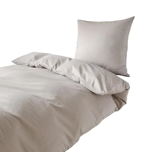 Traumschlaf Seersucker Bettwäsche Uni Silber, 1 Bettbezug 200 x 200 cm + 2 Kissenbezüge 80 x 80 cm - Bettwäsche-Sets aus luftiger, pflegeleichter Seersucker Baumwolle, ideal für heiße Sommernächte – bügelfrei und waschbar bis 60 Grad.