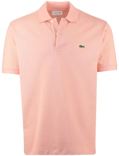 Lacoste Kurzarm Poloshirt in Rosa (XS) - Klassisches Poloshirt aus 100% Baumwolle, ideal für den lässigen Look. Mit Polokragen und Knopfleiste bietet es hohen Tragekomfort und Stil für jeden Tag.