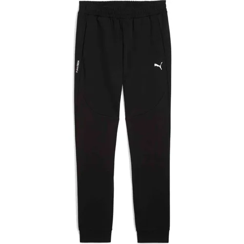 PUMA TECH PANTS DK CL Trainingshose schwarz XXL - Sportliche Trainingshose aus 82% Baumwolle für hohen Tragekomfort, ideal für aktive Freizeit und Training.