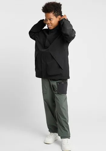 Outdoorjacke JACK WOLFSKIN TEEN 2L JACKET Y - Funktionsjacke für Kinder, atmungsaktiv und wasserdicht dank TEXAPORE, idealer Schutz vor Regen und Wind, sportlicher Look mit großen Taschen und verstellbarem Saum.