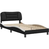 Bettgestell mit Kopfteil Schwarz und Weiß 100x200 cm - Modernes Bettgestell aus langlebigem Kunstleder für erholsamen Schlaf, mit einem stilvollen Wellen-Design und komfortablem Kopfteil für optimalen Halt beim Lesen oder Fernsehen.